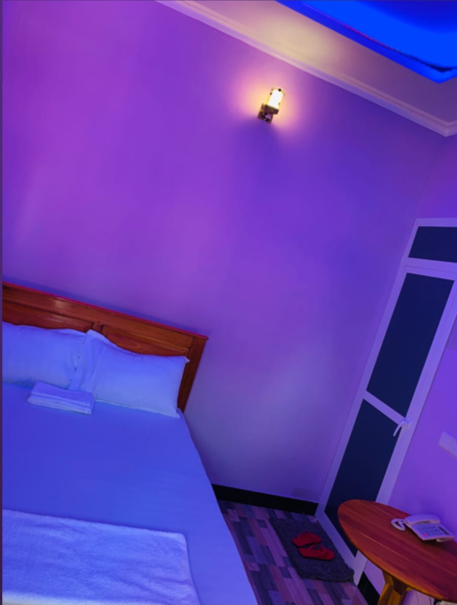 Cozy bedroom with ambient lighting
